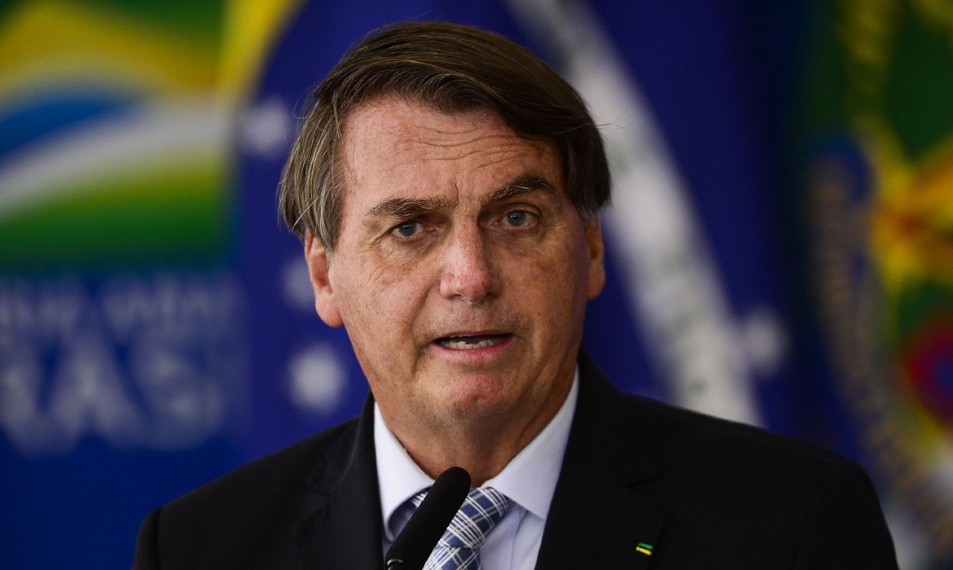 O presidente Jair Bolsonaro durante cerimônia para sanção dos projetos de lei que ampliam a aquisição de vacinas pelo Governo Federal.