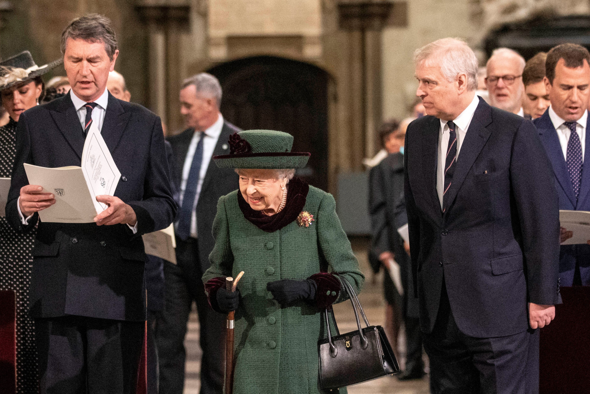  Britain's Queen Elizabeth II (C) and her son Britain's Prince Andrew, Duke of York (3R), arrive to attend a Service of Thanksgiving for Britain's Prince Philip, Duke of Edinburgh, at Westminster Abbey in central London on March 29, 2022. - A thanksgiving service will take place on Tuesday for Queen Elizabeth II's late husband, Prince Philip, nearly a year after his death and funeral held under coronavirus restrictions. Philip, who was married to the queen for 73 years, died on April 9 last year aged 99, following a month-long stay in hospital with a heart complaint. (Photo by RICHARD POHLE / POOL / AFP)
      