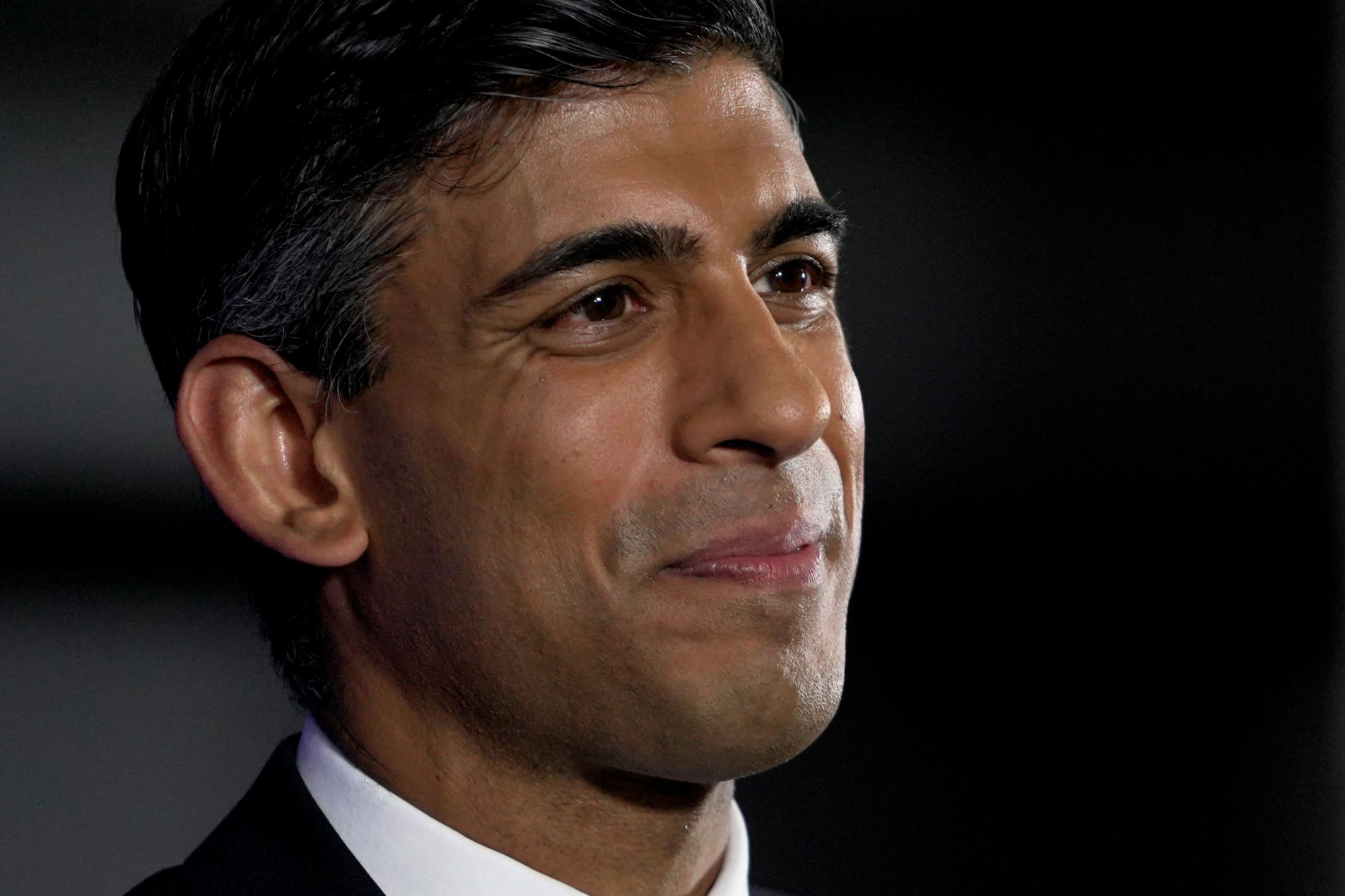  Rishi Sunak, Britain's former chancellor of the exchequer and candidate to become the next prime minister, delivers a speech at the Queen Elizabeth II Centre in London on July 12, 2022. The new UK prime minister to replace the outgoing Boris Johnson will be announced on September 5, the ruling Conservative party said, with 11 hopefuls currently vying for the job. (Photo by Niklas HALLE'N / AFP)

      