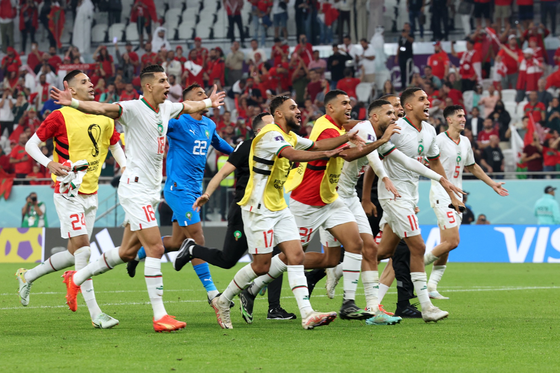  Morocco's players celebrate winning the Qatar 2022 World Cup Group F football match between Canada and Morocco at the Al-Thumama Stadium in Doha on December 1, 2022. (Photo by FADEL SENNA / AFP)