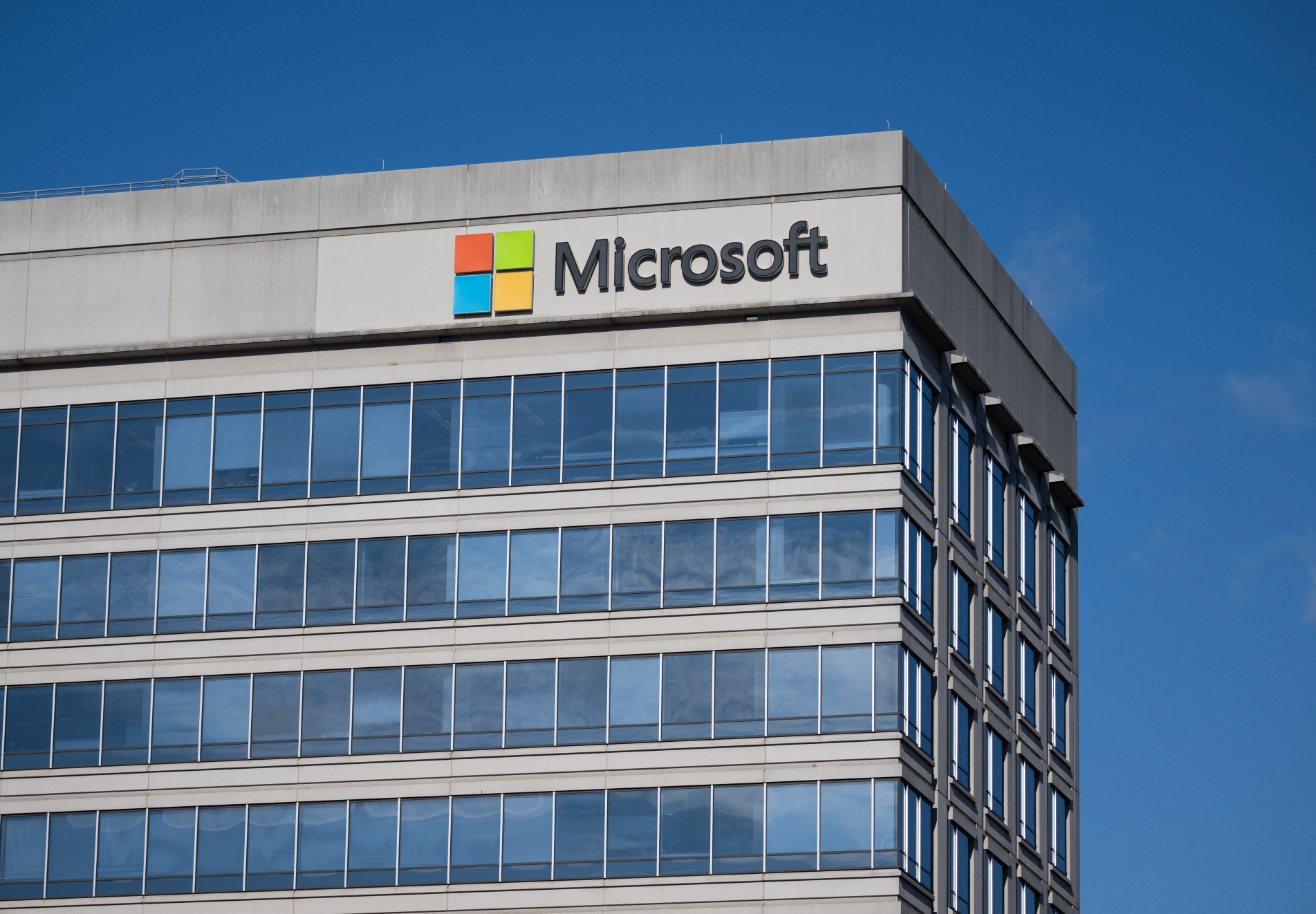  A building with offices belonging to Microsoft is seen in Chevy Chase, Maryland, January 18, 2023. - Microsoft on January 18, 2023 said it would layoff 10,000 employees in the coming months as the economic downturn continues to punish US tech giants. (Photo by SAUL LOEB / AFP)