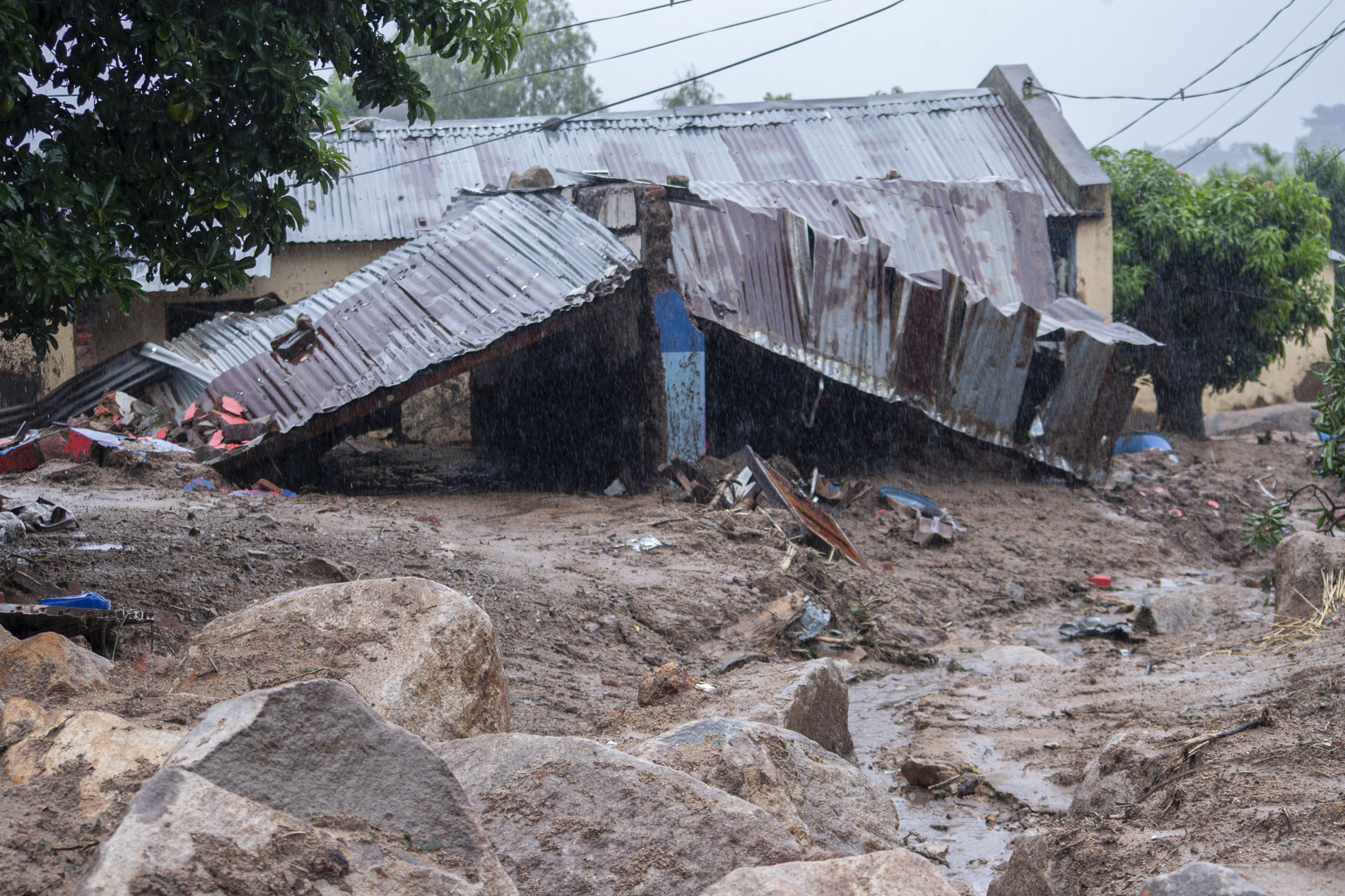  A general view of a collapsed structure in Blantyre on March 14, 2023, caused by heavy rains following cyclone Freddy's landfall. - Cyclone Freddy, packing powerful winds and torrential rain, killed more than 100 people in Malawi and Mozambique on its return to southern Africa's mainland, authorities said on March 13, 2023.
Freddy, on track to become the longest-lasting storm on record, barrelled through southern Africa at the weekend for the second time within a few weeks, making a comeback after a first hit in late February. (Photo by Amos GUMULIRA / AFP)