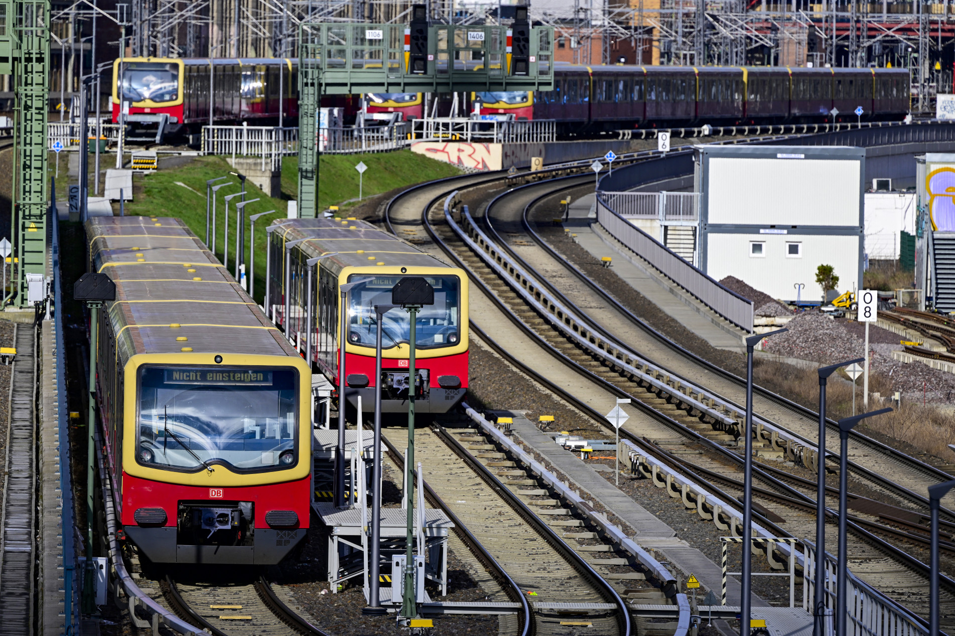  City trains sit idle on the tracks in east Berlin on March 27, 2023. - Germany's transport network was almost brought to a complete standstill on Monday as two of the country's largest unions went on strike.
Unions demanding higher wages to help their members cope with the rising cost of living
saw staff at airports, and public transport walk out after midnight for a 24-hour strike. (Photo by John MACDOUGALL / AFP)
      Caption