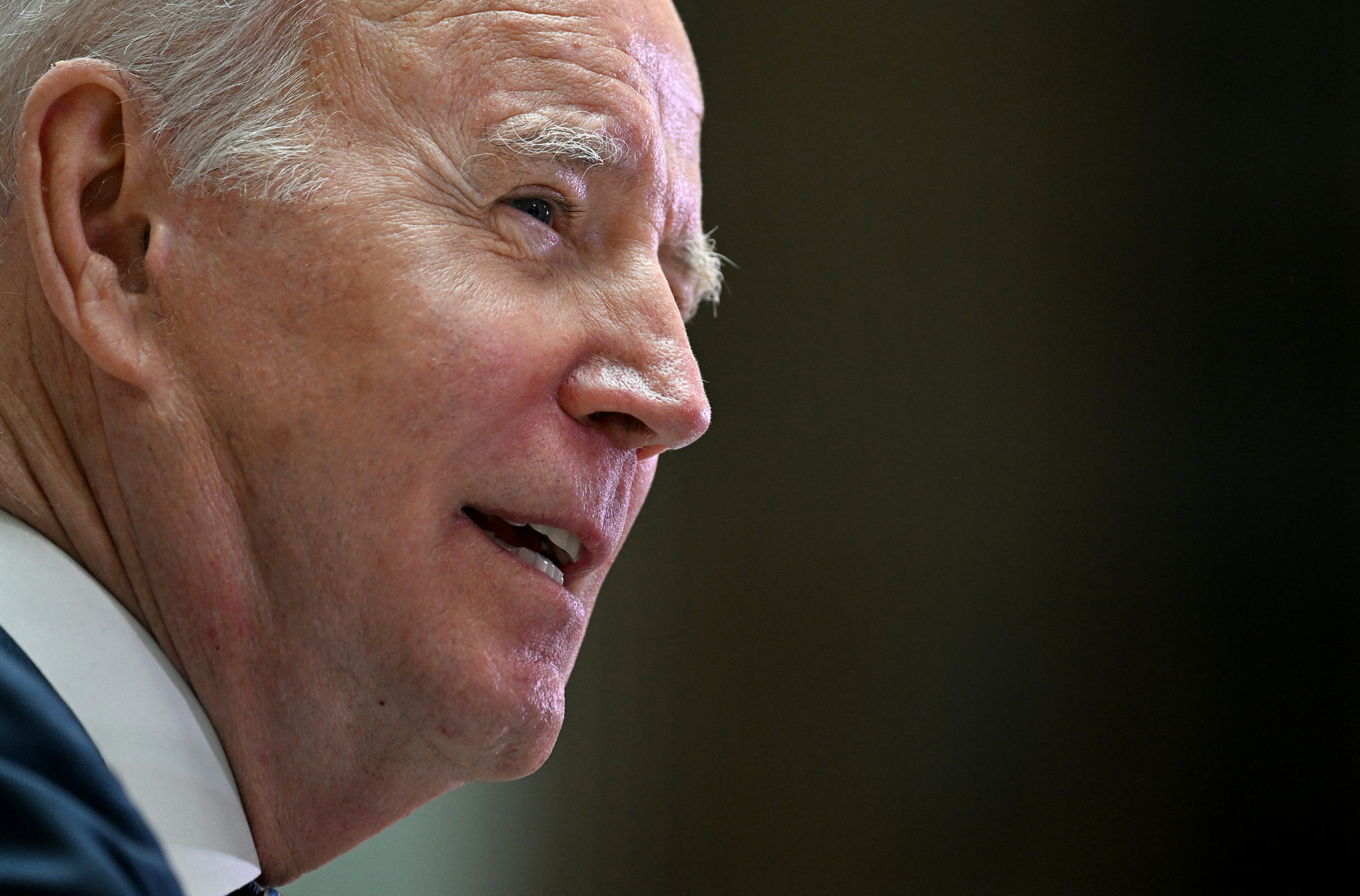  US President Joe Biden delivers a speech on business development at Ulster University in Belfast on April 12, 2023, as part of a four day trip to Northern Ireland and Ireland for the 25th anniversary commemorations of the 