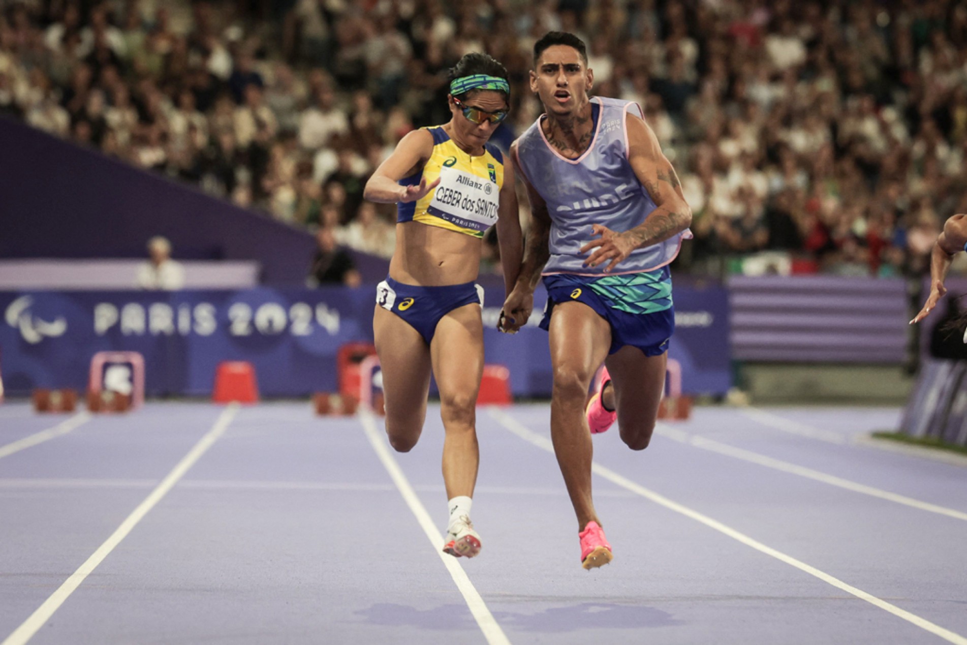 Paratleta, acompanhada por atleta-guia, fez tempo de 11s83
