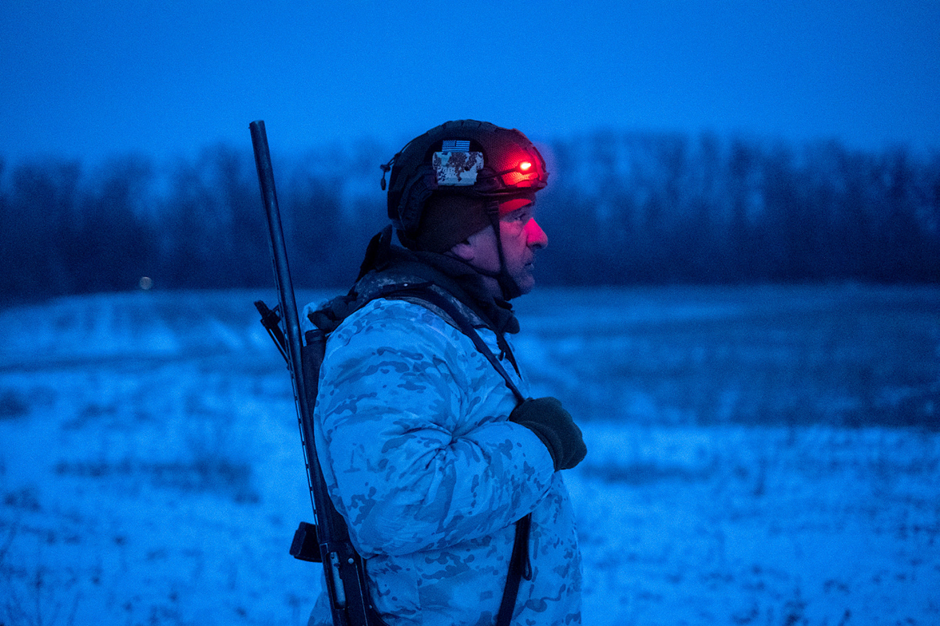  In this handout photograph taken on January 21, 2026 and released on January 22, 2026 by the press service of the 93rd Kholodnyi Yar Separate Mechanized Brigade of the Ukrainian Ground Forces, a Ukrainian soldier stands in a field at an undisclosed location near Druzhkivka, Donetsk region, amid the Russian invasion of Ukraine. (Photo by Iryna Rybakova / The 93rd Kholodnyi Yar Separate Mechanized Brigade / AFP) / RESTRICTED TO EDITORIAL USE - MANDATORY CREDIT 